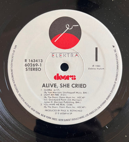 Alive, She Cried