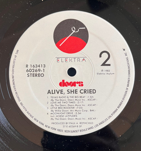 Alive, She Cried